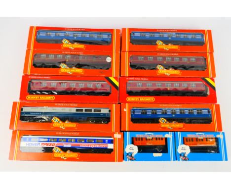 Airfix - A rake of 11 boxed OO gauge passenger coaches from Hornby. Lot includes Hornby R454 Mk.3a Open Coach 'Hoverspeed'; R