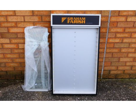 Graham Farish - A wall mounted Graham Farish illuminated display cabinet with glass sliding door. The cabinet measures approx