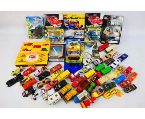 Matchbox - Hot Wheels - Corgi - Majorette - A collection of loose and carded vehicles including 1992 Nigel Mansell F1 car and
