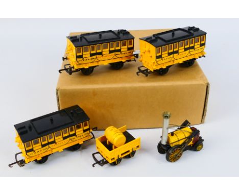 Triang - Hornby - An unboxed Triang / Hornby R651 0-2-0 Stephenson's Rocket train with three Liverpool and Manchester Railway