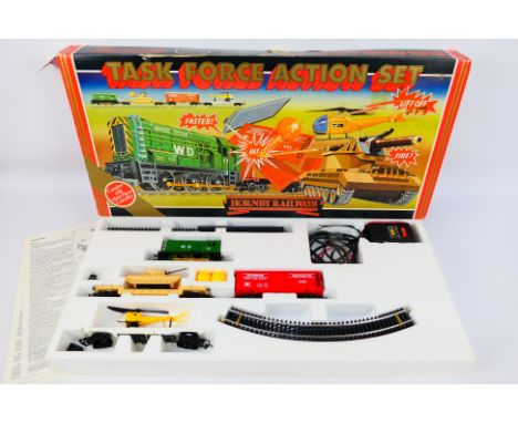 Hornby - A vintage boxed Hornby R580 OO gauge 'Task Force Action Set'. The set contains R339 Diesel locomotive Op.No. WD 17; 