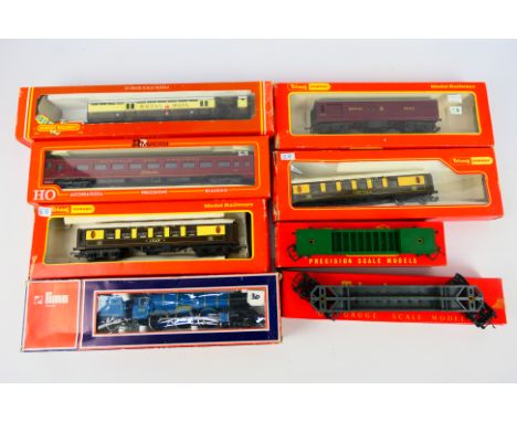 Lima - Triang  - Hornby - Rivarossi  - A boxed OO gauge steam locomotive and tender with a group of boxed OO and HO gauge rol