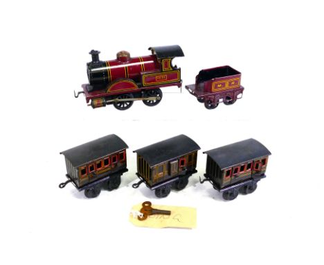 Bing - An unboxed Gebruder Bing O gauge 0-4-0 clockwork steam locomotive and tender, plus three third class Bing carriages. T