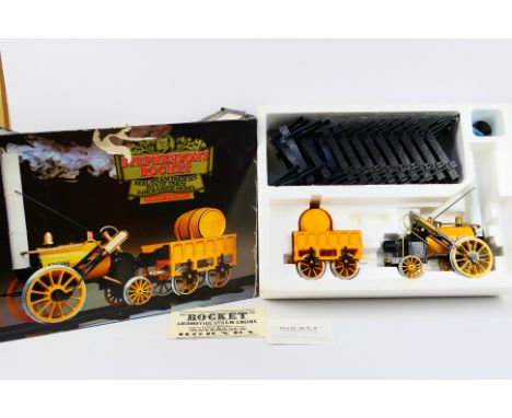 Hornby - A boxed Hornby G100 3 1/2'' gauge Stephensons Rocket Real Steam Train Set, comprising locomotive and tender housed i