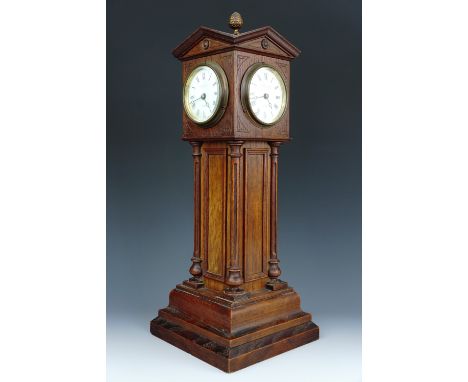 A late 19th Century four-faced oak architectural tower-form table clock by Henry Marc, retailed by Bracher and Sydenham of Re