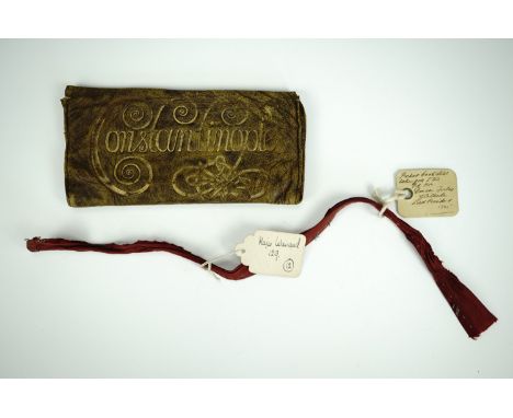 An 18th Century gilt-tooled leather pocket book or wallet, the decoration including the text "Constantinople", bearing old in