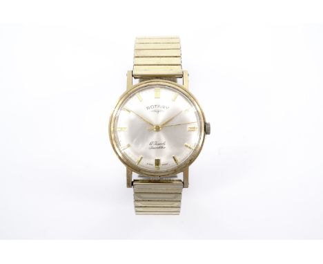 A 1960s Rotary 9 ct gold wristwatch, having a Swiss 17 jewel incabloc manual-wind movement and radially brushed silver face w