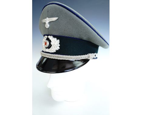 A German Third Reich army officer's peaked cap bearing medical branch waffenfarbe 