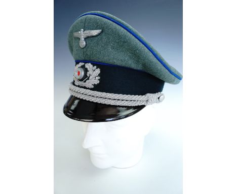 A German Third Reich army officer's peaked cap bearing transport waffenfarbe