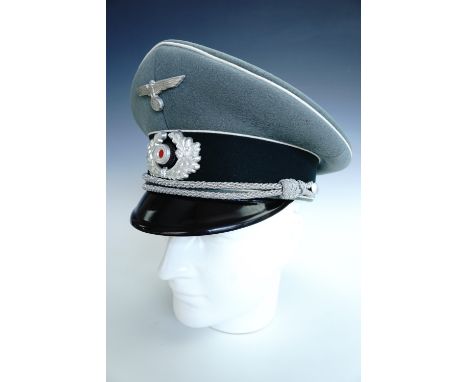 A German Third Reich army officer's peaked cap bearing infantry waffenfarbe