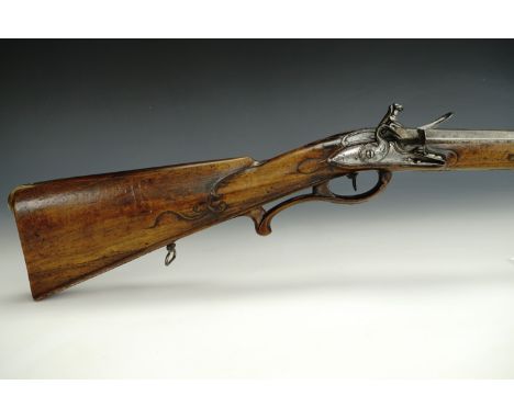 An 18th Century German flintlock sporting rifle, the 70 cm barrel octagonal for half its length, of approximately 15 mm bore 