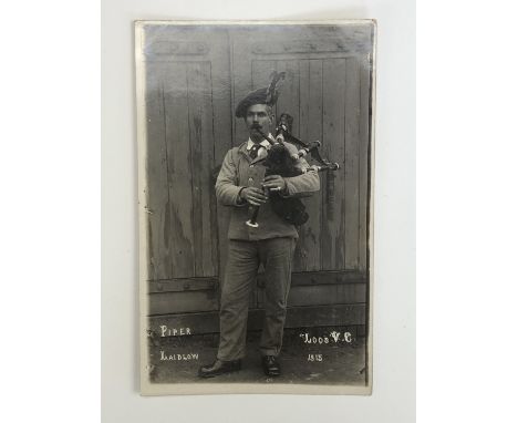 [Victoria Cross / Medal / Autograph] A signed portrait photographic postcard of Piper Daniel Laidlaw, VC, KOSB, the Piper of 