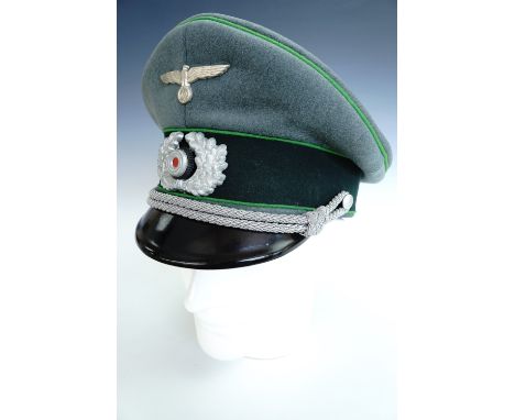 A German Third Reich army officer's peaked cap bearing Gebirgsjäger waffenfarbe 