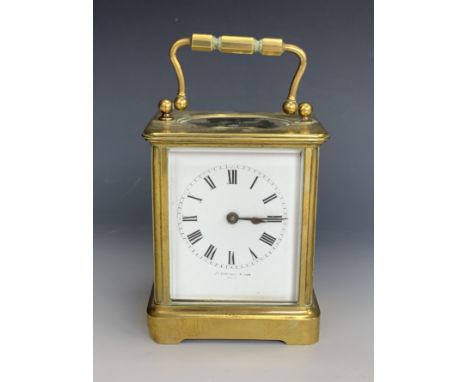 An antique brass corniche-cased carriage clock by J Ritchie and Son, Paris, of diminutive stature, having enamelled dial and 