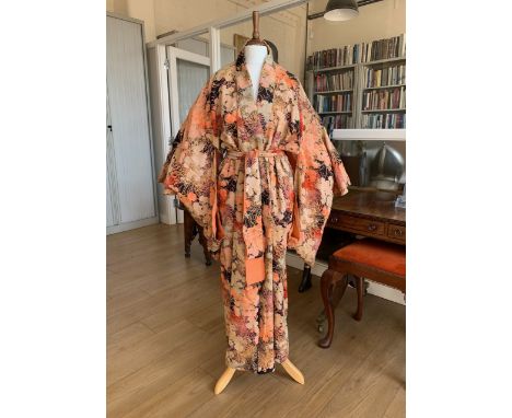 A 1930s kimono in a printed cotton fabric, incorporating chrysanthemums and daisies, with original sash
