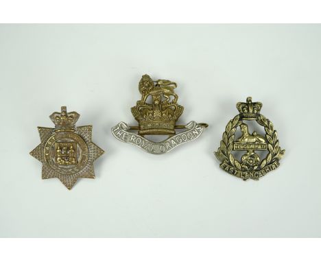 Three late Victorian British army cap badges