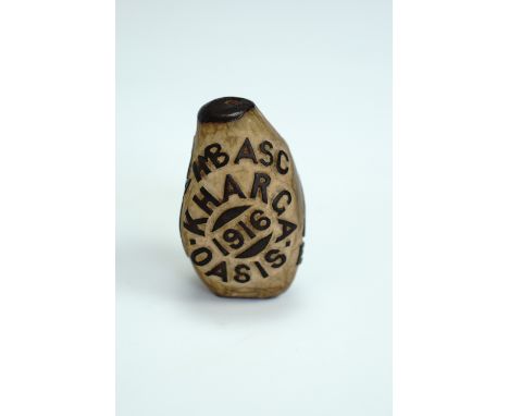 A Great War Ottoman Turkish Prisoner of War carved nut, relief-carved and stained in depiction of a star and crescent, a pyra