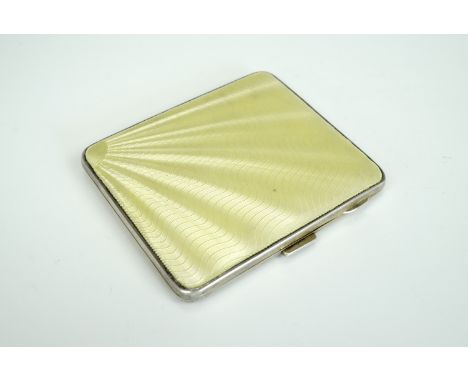 A fine 1920s guilloche enamelled silver cigarette case, each face rose-engine-turned, one face pale yellow bas taille enamell
