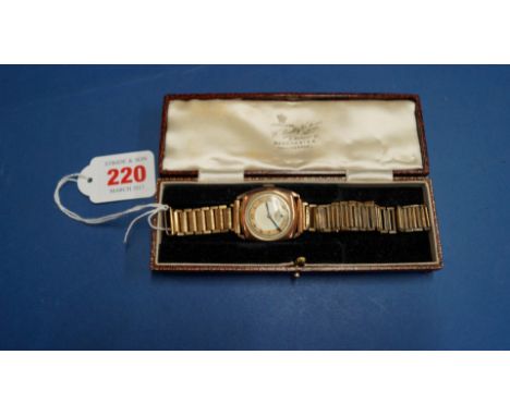 A vintage unsigned 9ct gold gentleman's mechanical wristwatch, having 2.5cm dial decorated Arabic numerals, case hallmarked L