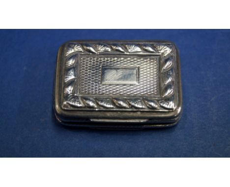 A George III engine turned silver vinaigrette, by Samuel Pemberton, Birmingham 1816, the lid decorated sea shells and vacant 