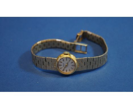 A vintage 18ct and 9ct gold International Watch Company ladies manual wristwatch.   Condition Report:  TOTAL inclusive weight