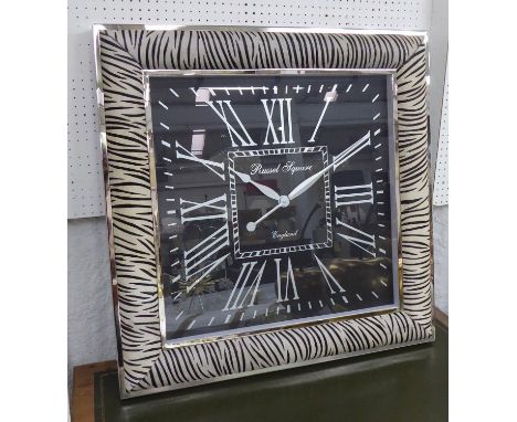WALL CLOCK, over sized design with faux zebra skin frame, 81.5cm x 81.5cm. 