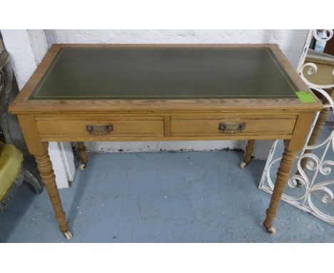 WRITING TABLE, late Victorian ash with two frieze drawers, green leather top and ceramic castors, 105.5 cm x 54.5cm x 75.5cm.