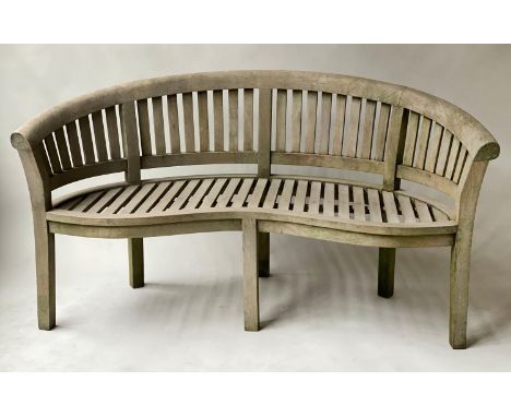 BANANA GARDEN BENCH, weathered solid teak with bow back and slatted construction, 162cm W. 