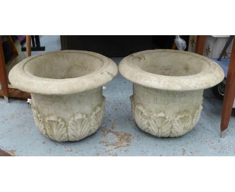 GARDEN PLANTERS ON STANDS, a pair, composite stone, 111cm x 50cm diam. (2) 