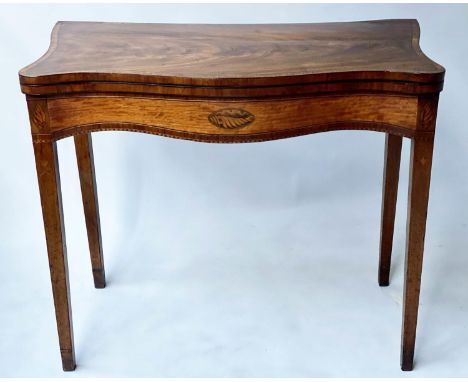 GEORGE III SERPENTINE CARD TABLE, 18th century flame mahogany, satinwood and crossbanded with panelled frieze, paterae corner