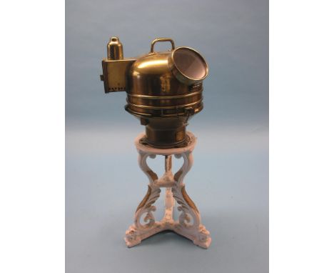 An early 20th century ship's binnacle, inset compass, No. 571K, Pat. 0919 Compass, brass on painted cast iron tripod stand, 2
