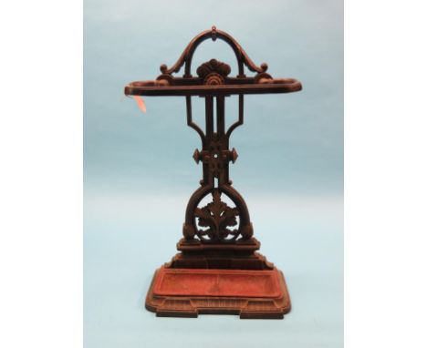 A Victorian cast iron stick-stand, with parcel-gilt detail and drip-tray, 27in. high 