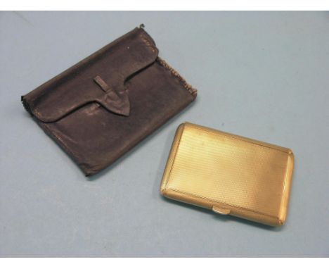 An engine-turned 9ct. gold cigarette case, Birmingham 1931, 58.6 grams, personalised