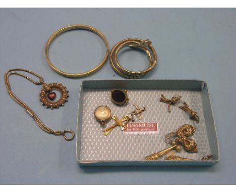 A Victorian 15ct. gold pendant, set seed-pearls, a 9ct. gold serpent brooch, engraved 9ct. gold bangle, three pairs of ear-ri