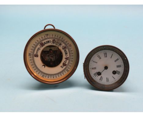 An aneroid barometer, enamelled dial and gilt-brass case, 5.25in., together with a French 8-day mantel clock dial and movemen