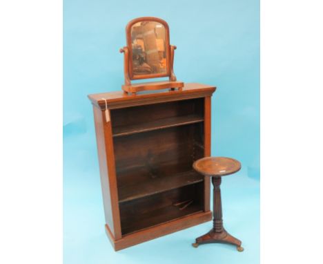 A Victorian oak open bookcase, three adjustable shelves, together with a Victorian tripod table, reeded circular top on reede