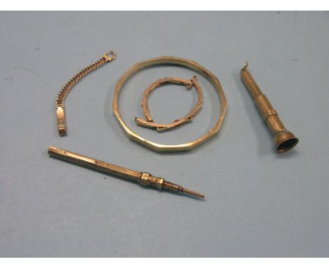 A 9ct. gold bangle, 16 grams, two 9ct. gold watch bracelets, 9ct. gold cigar cutter and an engraved yellow metal pencil 