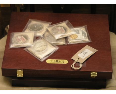Limited edition coins, two cased sets, Pre-decimalisation Coins, British Banknotes, six other similar coins, each in presenta