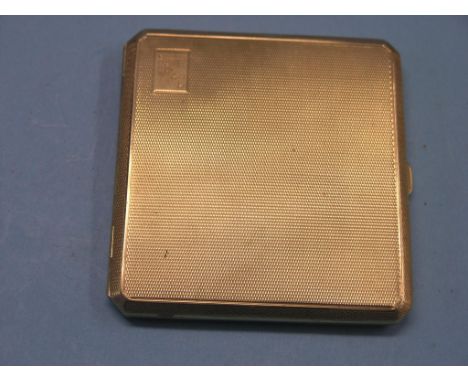 An engine-turned 9ct. gold cigarette case, Birmingham 1928,122.6 grams gross; personalised