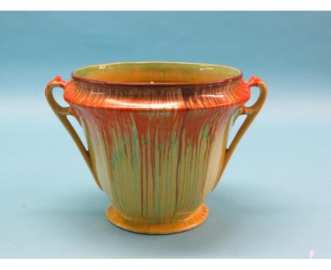 A Clarice Cliff jardiniere, Delicia, twin-handled tapering shape with bright running glazes, indistinct printed mark, 10.5in.