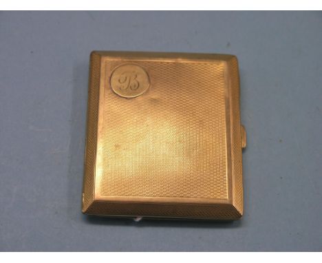 An engine-turned 9ct. gold cigarette case, Birmingham 1919, 77.3 grams - monogrammed