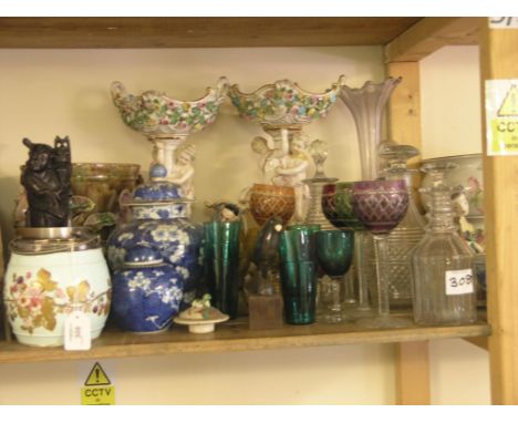 Two mid-19th century prismatic-cut decanters, Victorian and later coloured drinking glassware, pair of Victorian ceramic figu