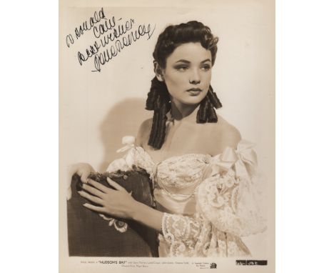  TIERNEY GENE: (1920-1991) American Actress. A good signed and inscribed sepia 8 x 10 photograph of Tierney in a half length 