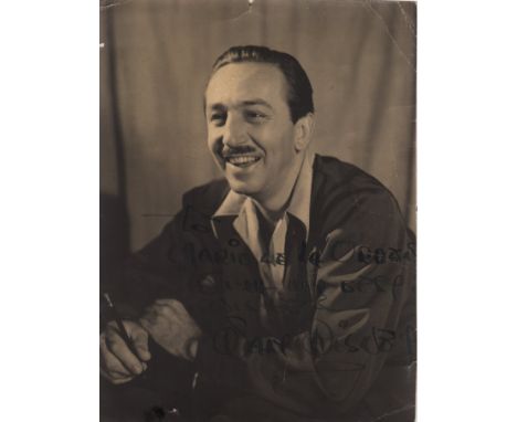 DISNEY WALT: (1901-1966) American Animator, Academy Award winner. Vintage signed and inscribed sepia 7 x 9 photograph of Disn