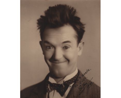  LAUREL STAN: (1890-1965) British Film Comedian. A good vintage signed and inscribed sepia 6.5 x 8 photograph of Laurel in a 