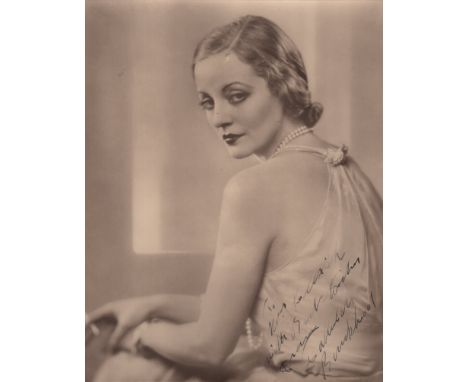 BANKHEAD TALLULAH: (1902-1968) American Actress. A good vintage signed and inscribed sepia 8 x 10 photograph of Bankhead seat