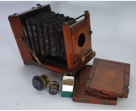 LEWIS, PALMER & LONGKING, AMERICAN 'NEVER BEHIND' MAHOGANY AND BRASS MOUNTED PLATE CAMERA with brass lens (loose), two plate 