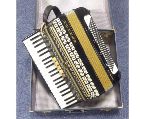 HOHNER VIRTUOLA III PIANO ACCORDION in black finish case with 120 bases and 5 treble couplers, (late 20th Century and as new)