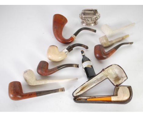 COLLECTION OF NINE SMOKING PIPES comprising four with wooden bowls, a Peterson's of Dublin example with Meerschaum bowl and I