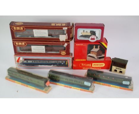 THREE GRAFAR BOXED SOUTHERN RAILWAYS 'OO' SCALE PASSENGER COACHES, card mounted under clear plastic, FOUR OTHER BOXED PASSENG